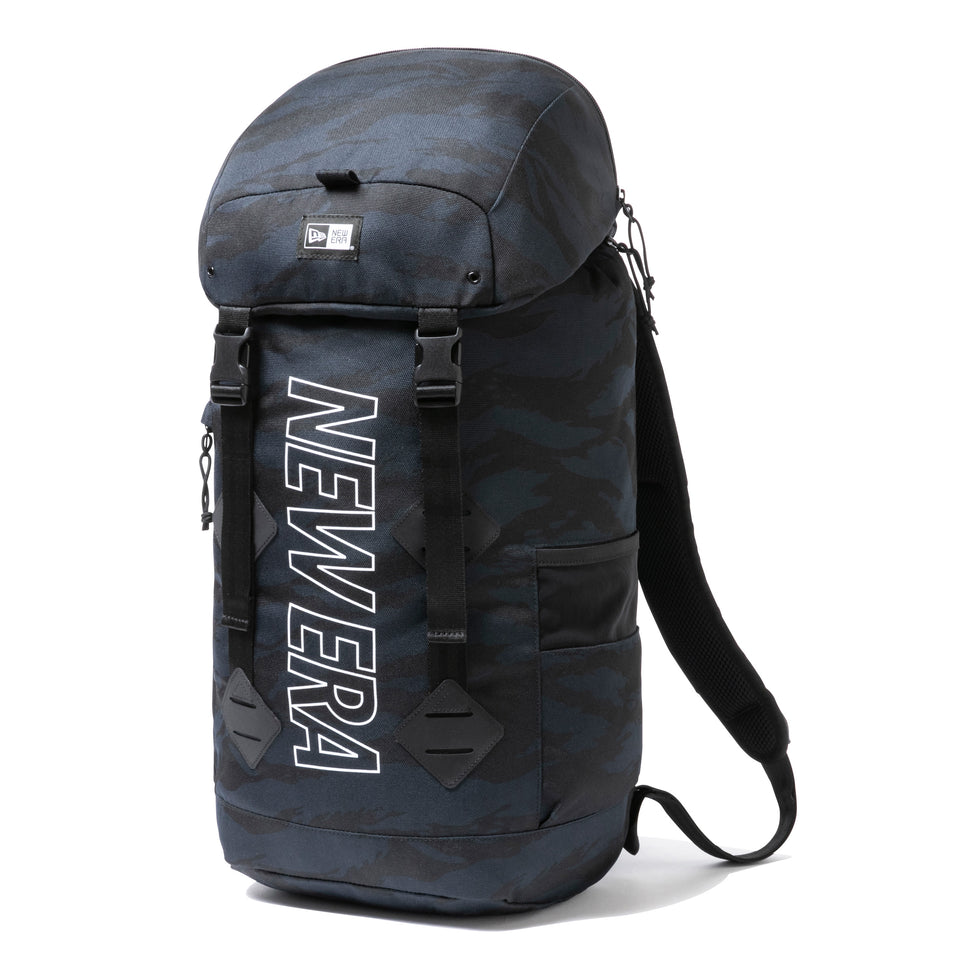 ラックサック 35L プリントロゴ アウトライン タイガーストライプカモネイビー