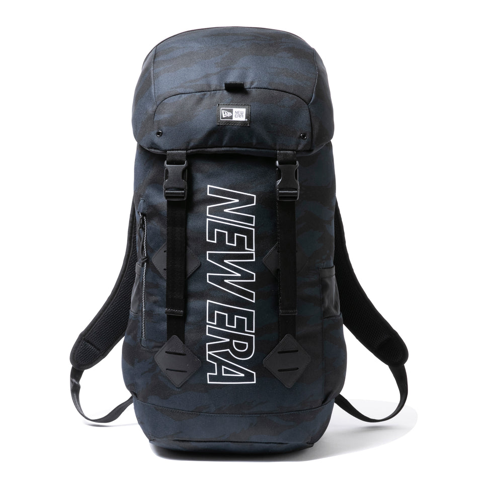 ラックサック 35L プリントロゴ アウトライン タイガーストライプカモネイビー